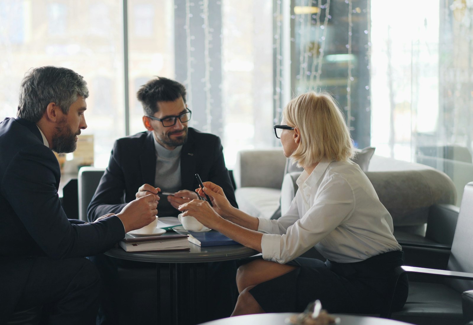 Consultants reviewing audit findings in a meeting